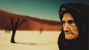 Old woman in the desert